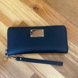 Michael Kors Black Wristlet with Gold Plate